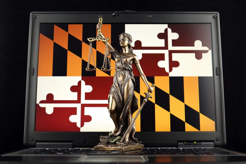 Maryland flag with a statue representing justice