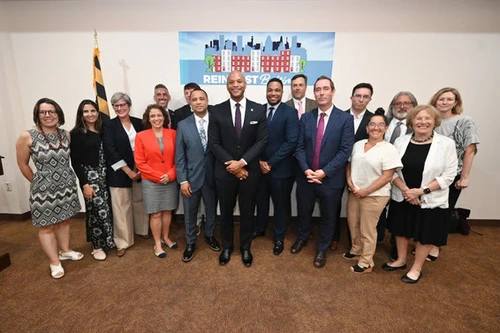 A group of people smiling at the camera.