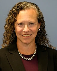 Headshot of Dana Shoenberg.