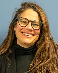 Headshot of Nel Andrews.