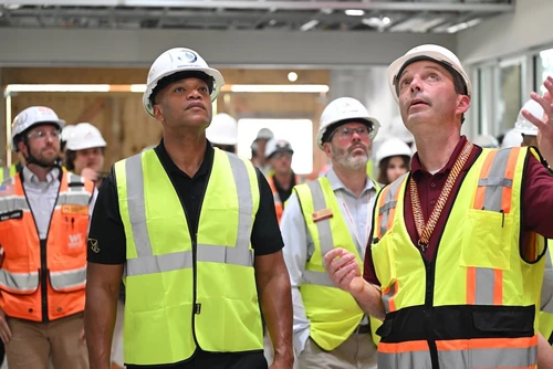 Governor Moore wearing hard hat indoors