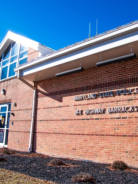 The front entrance of the Maryland State Police JFK Memorial Highway Barracks 