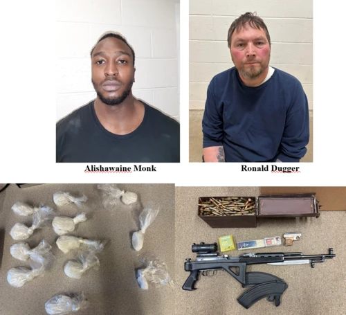 Two men posed against a neutral backdrop, with bags of a white substance and firearms displayed below. 