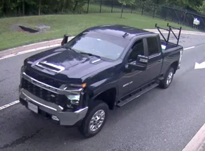 dark blue Chevrolet Silverado pick up truck