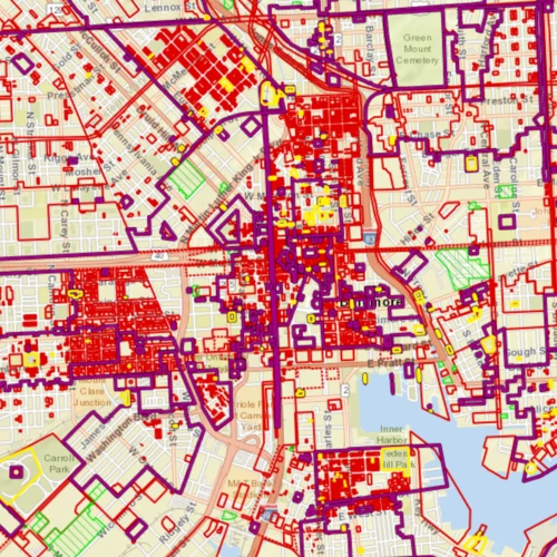 GIS map of Baltimore with colored shapes indicating various sites and districts.