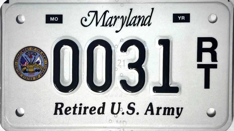 White license plate with the Army seal to the left of the plate number.