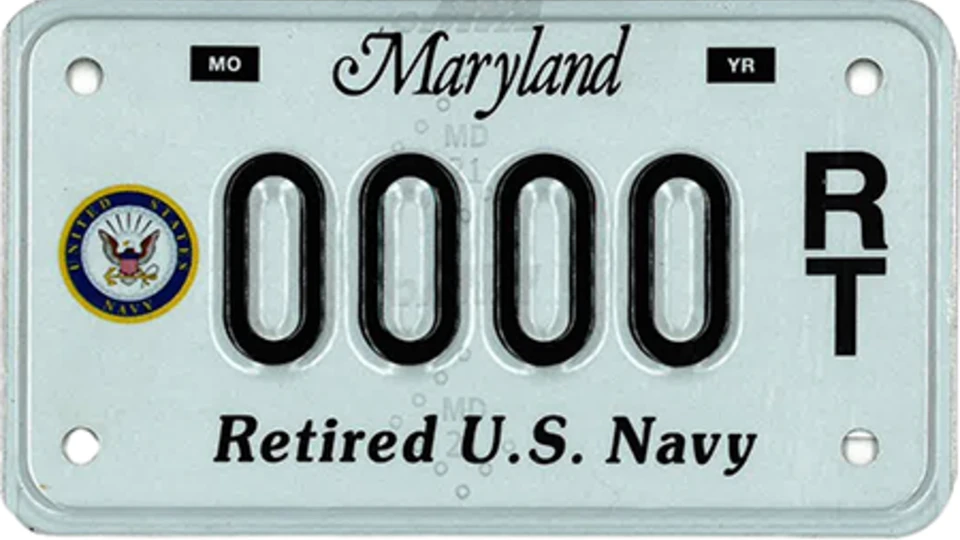 Light blue plate with the Navy seal to the left of the plate number.