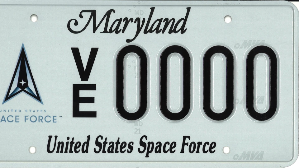 Light blue plate with the Space Force seal to the left of the plate number.