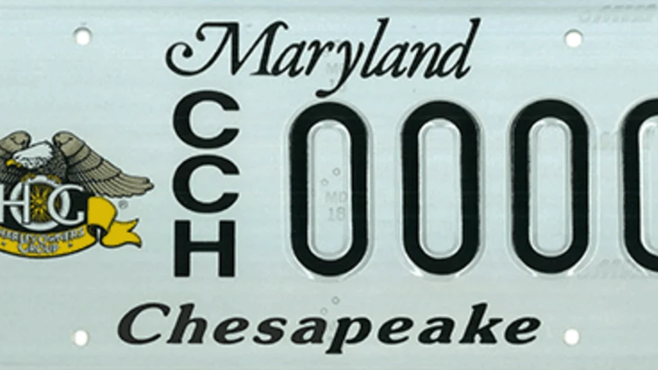 Maryland license plate with "CCH" on the left, a Harley Owners Group emblem, and "Chesapeake" at the bottom.