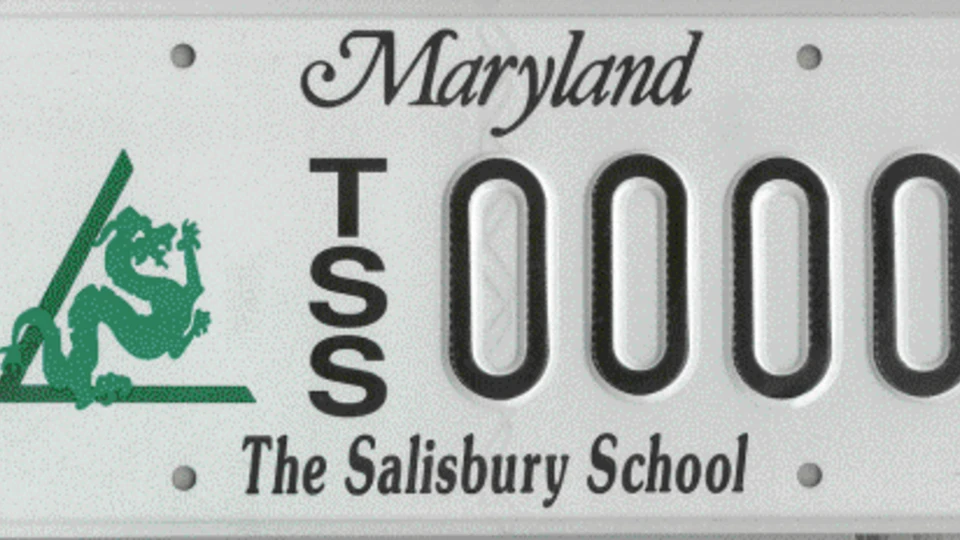 Maryland license plate with a green dragon logo, vertical letters TSS, the number 0000, and the text "The Salisbury School" at the bottom.