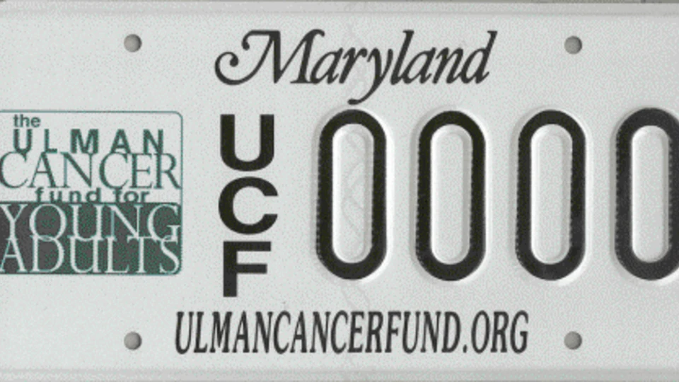 A Maryland license plate featuring the logo for The Ulman Cancer Fund for Young Adults and the website ULMANCANCERFUND.ORG.
