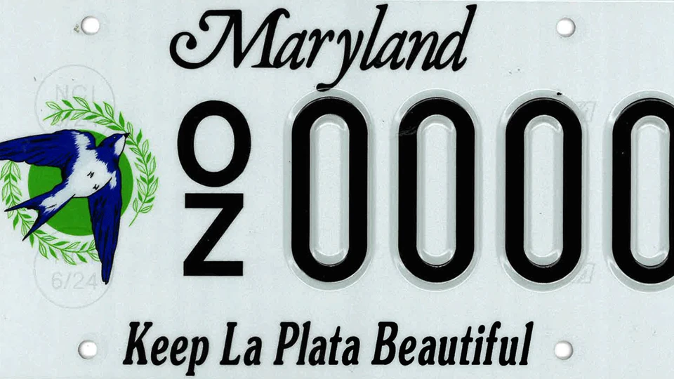 Maryland license plate featuring a bird and a green wreath. The text reads "Maryland" at the top and "Keep La Plata Beautiful" at the bottom.