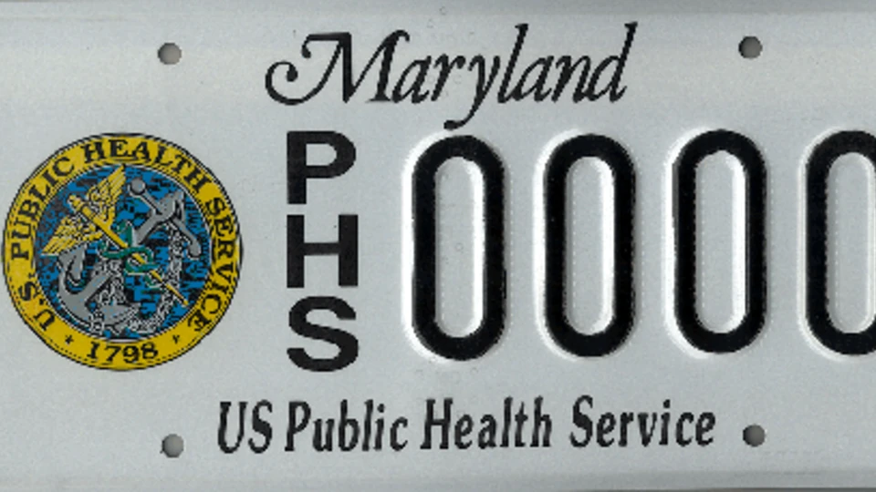 A Maryland license plate featuring the U.S. Public Health Service seal, the letters "PHS," and the text "US Public Health Service".