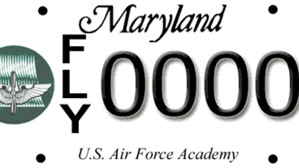 Maryland license plate with a green U.S. Air Force Academy crest, the letters FLY stacked vertically, and the placeholder number 0000.