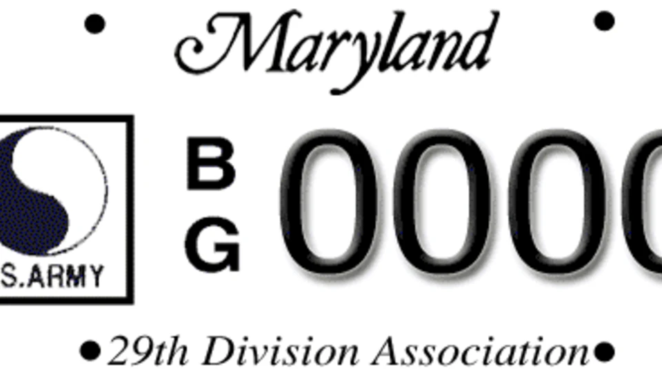 Maryland license plate with a 29th Division yin-yang logo, vertical text BG, number 0000, and "29th Division Association" at the bottom.