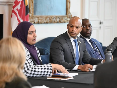 Governor Moore at a cabinet meeting